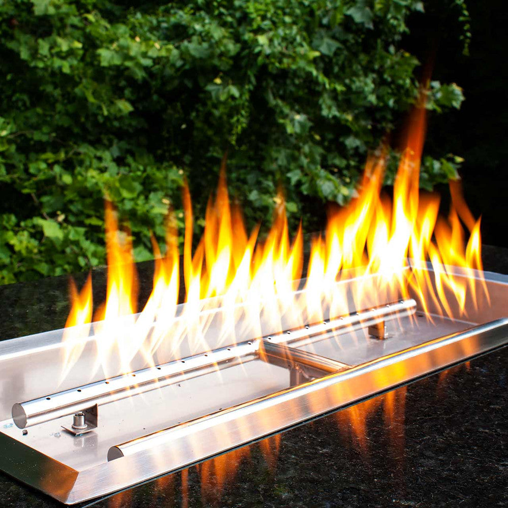 Side angle view of rectangular fire pit pan with h-burner