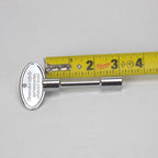 3" Key next to measuring tape