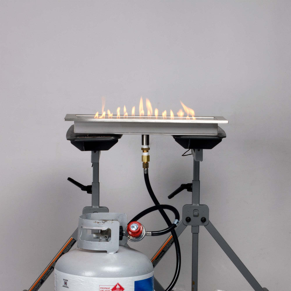 High pressure adjustable regulator installed on a propane tank and burner pan, on a low flame height