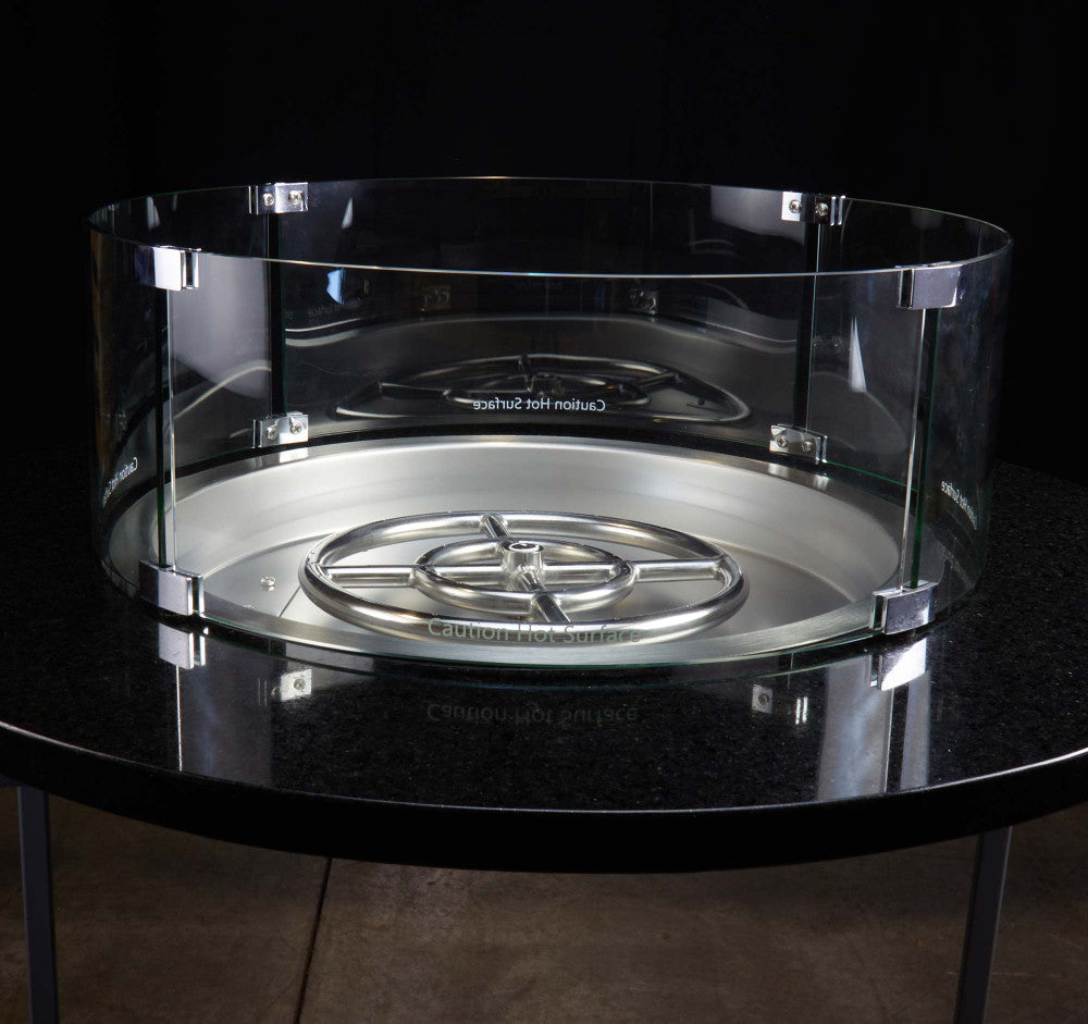 Our 8 inch tall 23" round flame guard around a 19" Round Burner Pan
