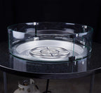 A 19" round propane fire pit burner pan in a granite table top with a 23" round flame guard around it. 