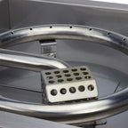 The protective cage of the thermocouple and spark igniter in a CSA Certified Propane Fire Pit kit. 