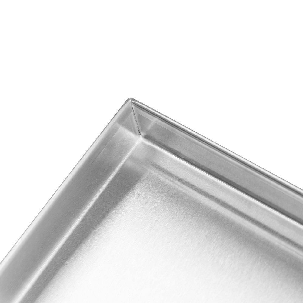 Close up of the wrapped edge on the Stainless Steel Fire Pit Cover for 30" x 10" Burner Pan