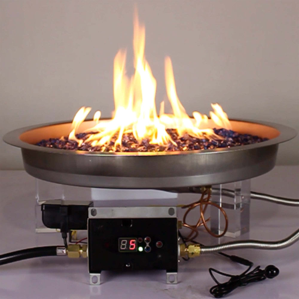 Propane 19" round remote control fire pit in use with flames