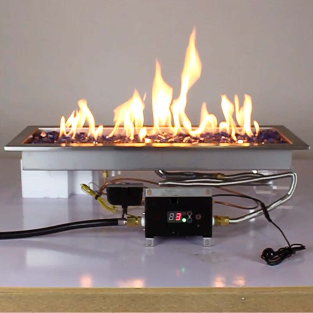 Flames from a 24" x 8" propane powered remote control fire pit kit