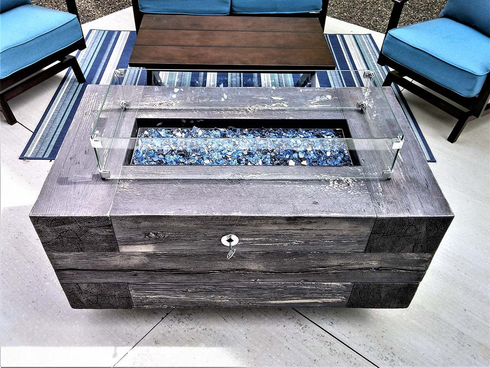 Fire Pit Wind Guard on a wooden fire table