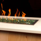 Green Fire glass in a propane fire table